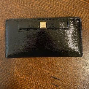 Kate Spade black wallet with bow on the front